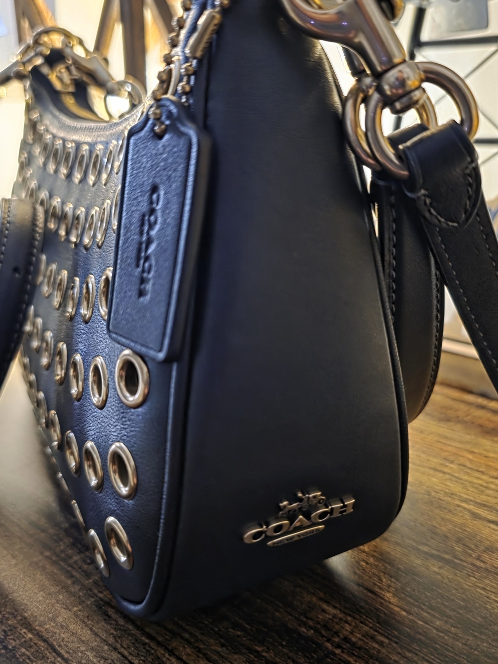Coach Black Leather Shoulder Bag with Gold Grommets
